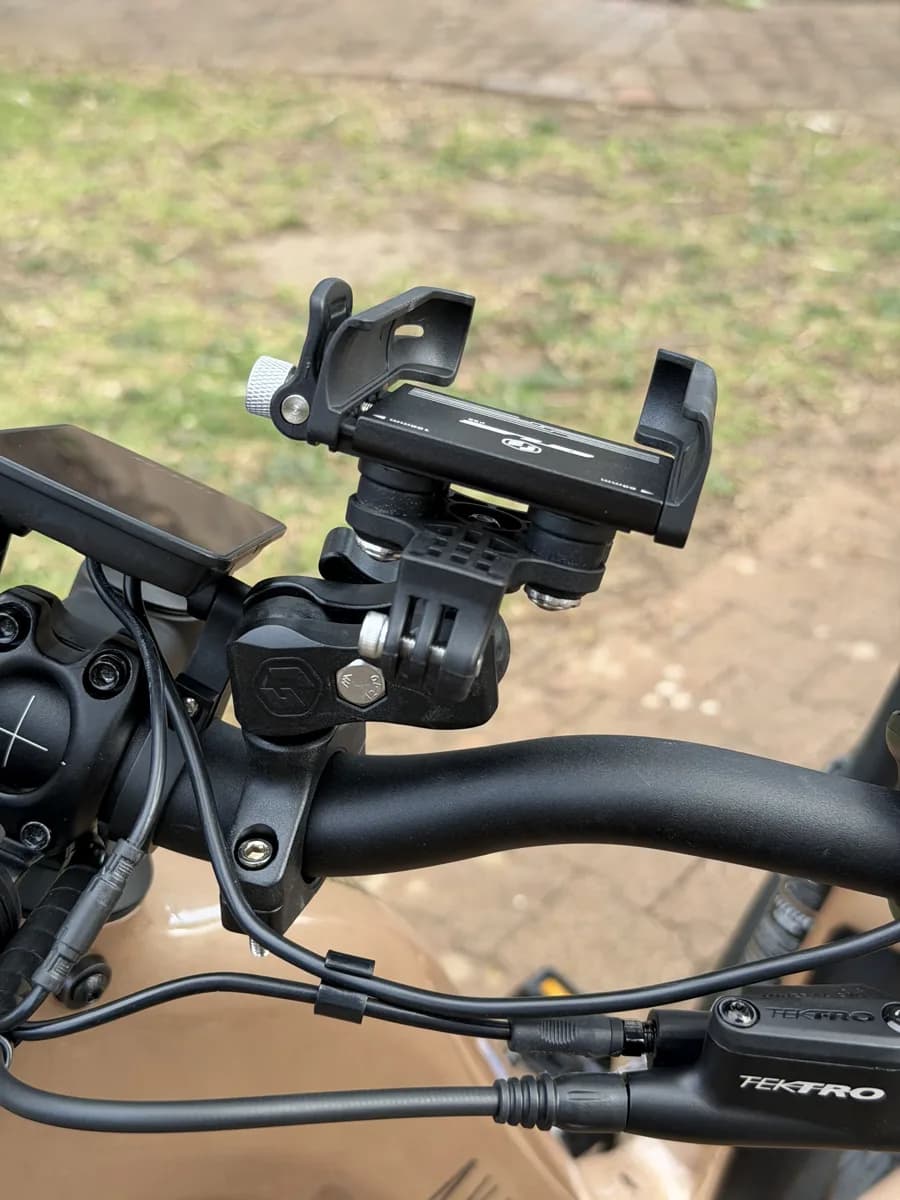 GUB P55 phone mount clamped to an e-bike handlebar