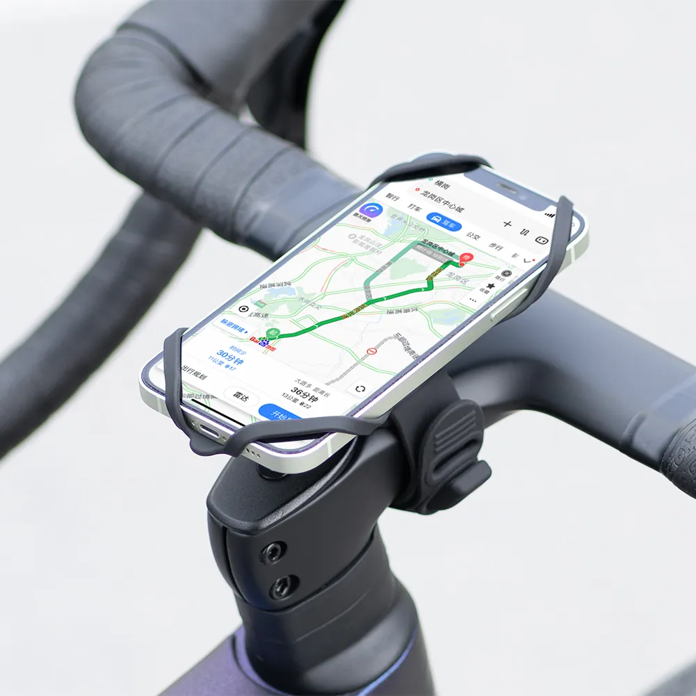 GUB P9 holding a phone showing navigation on a road bike stem