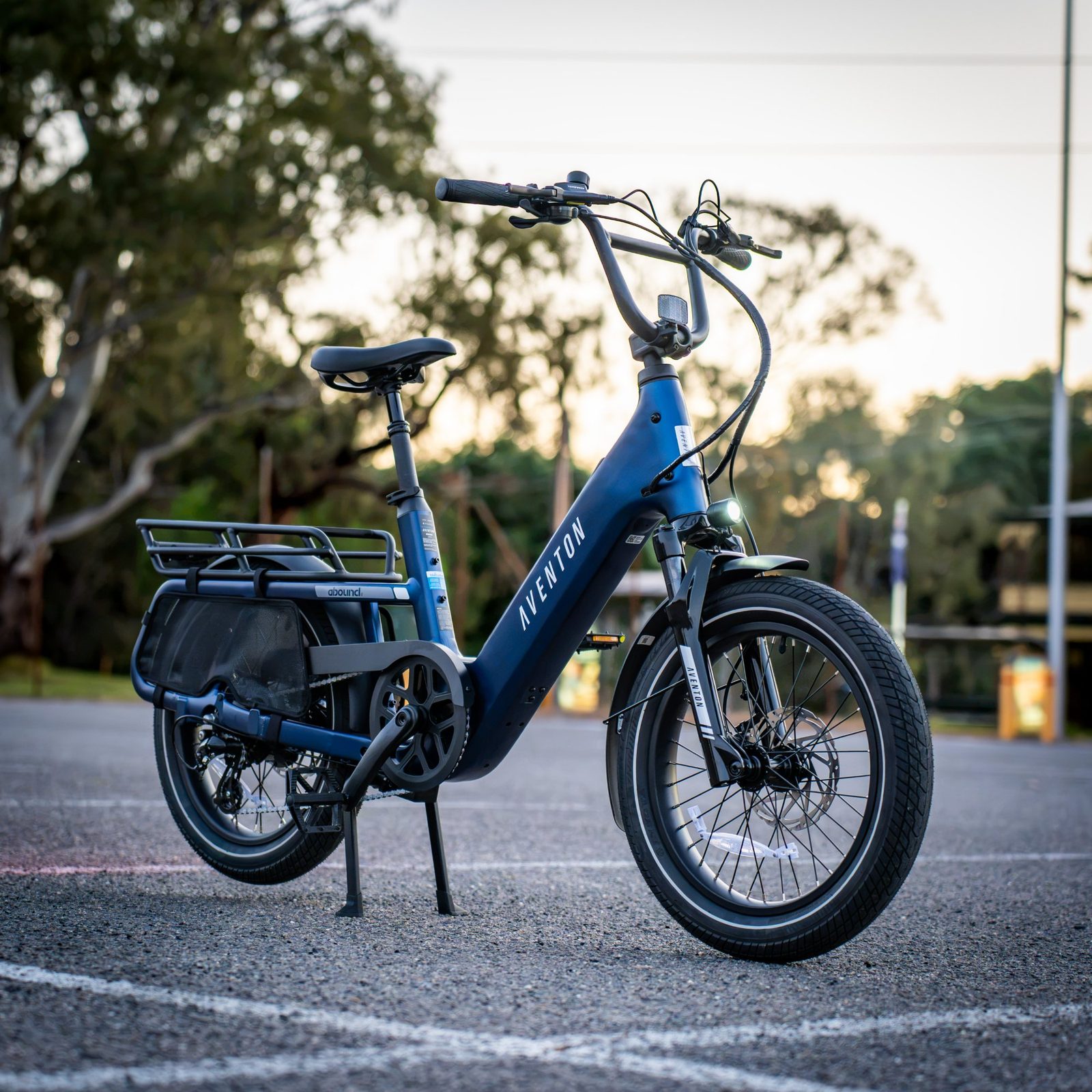 Aventon Abound SR compact cargo e-bike in Cobalt, front three quarter view