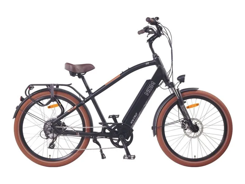 NCM Cru7 cruiser e-bike in matt black on a white background