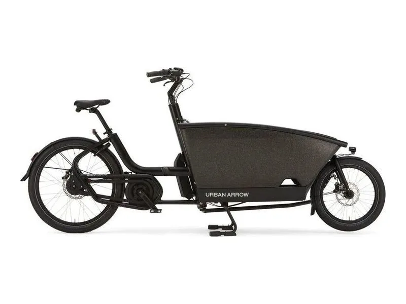 Urban Arrow Family front-loader cargo e-bike in black, side profile on white background